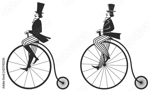 man in top hat on a retro bike