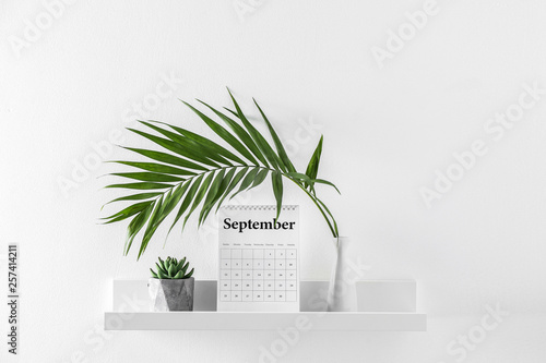 Flip calendar and vase with...