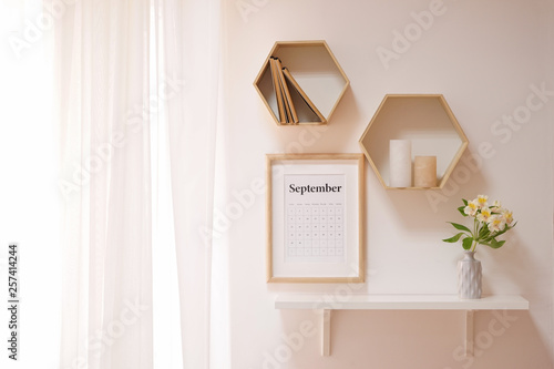 Calendar and shelves in int...