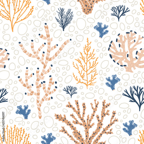 Seamless pattern with orange and blue corals, seaweed and bubbles on white background