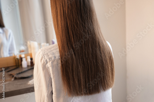 Young woman in hairdressing salon