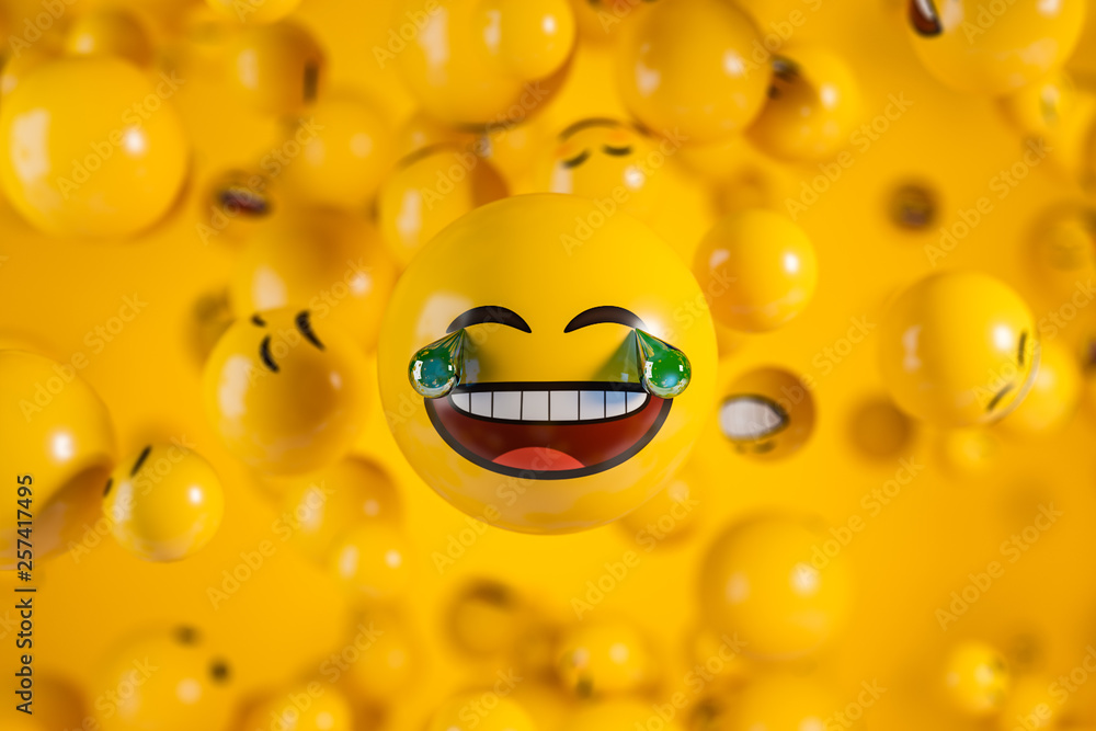Large laughing emoji face with tears over yellow background with blur.  Stock Illustration | Adobe Stock