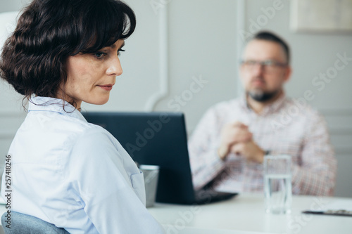 Miserable woman trying to find solutions for her problems