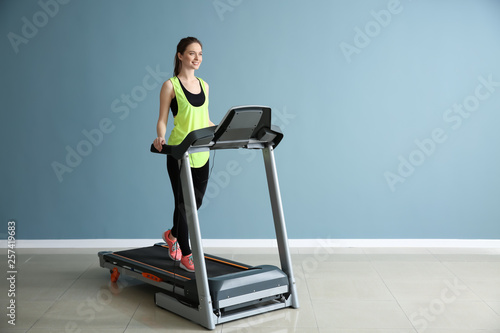 Sporty young woman training...