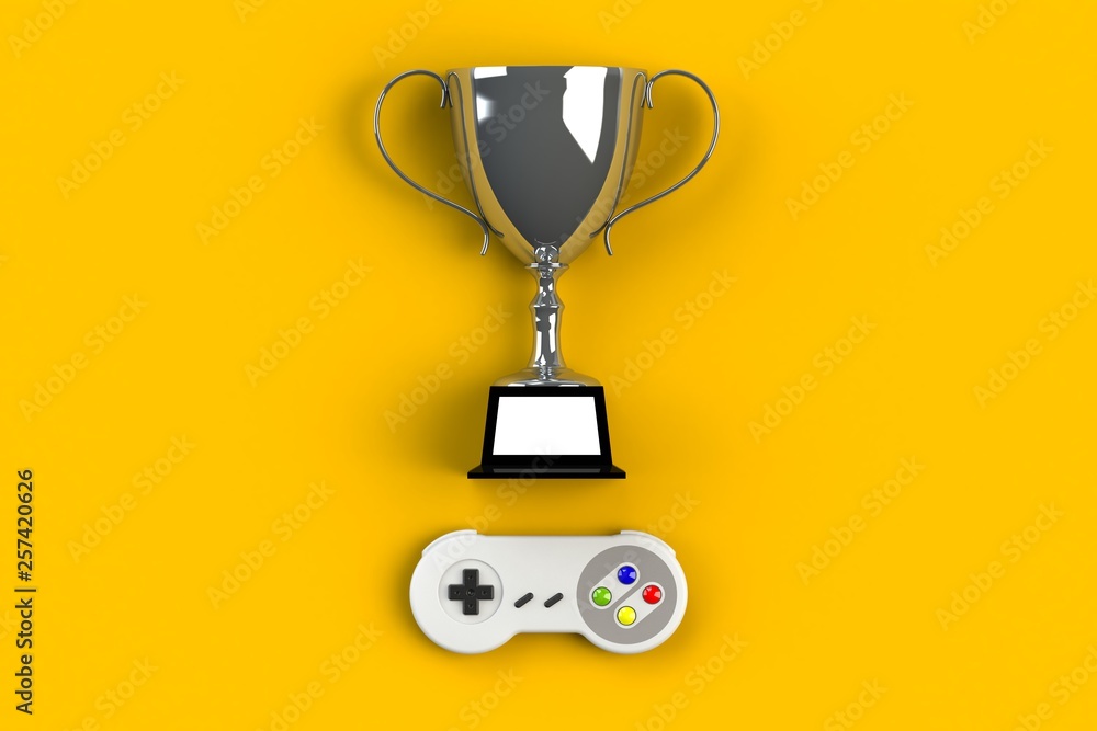 Video game console GamePad. Gaming concept. Top view retro joystick with trophy isolated on yellow background, 3D rendering Video game console GamePad. Gaming concept. Top view retro joystick with trophy isolated on yellow background, 3D rendering
