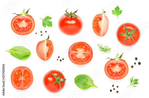 Collection of tomatoes, herbs and black pepper isolated on the white background - Image © ireneromanova