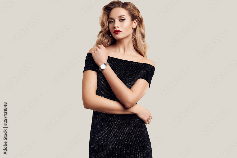 Gorgeous elegant sensual blonde woman wearing fashion black dress - obrazy, fototapety, plakaty 
