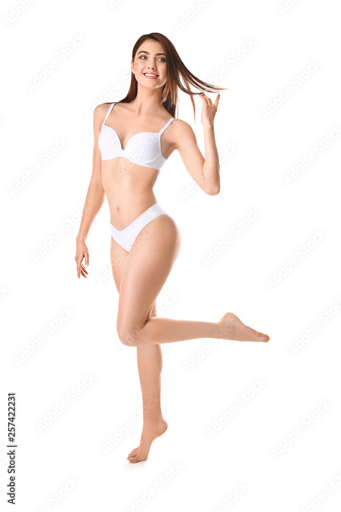 Beautiful young woman in underwear on white background Beautiful young woman in underwear on white background