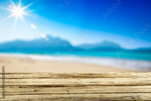 Desk of free space and summer sea landscape 