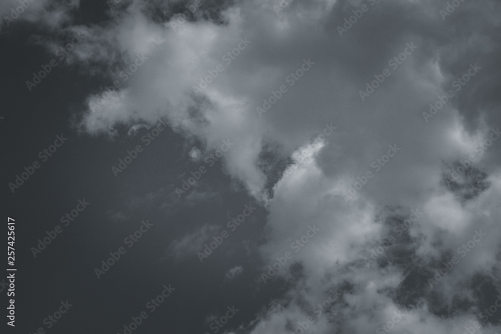 Storm clouds in the sky over the city. Gray gloomy sky before hurricane Storm clouds in the sky over the city. Gray gloomy sky before hurricane