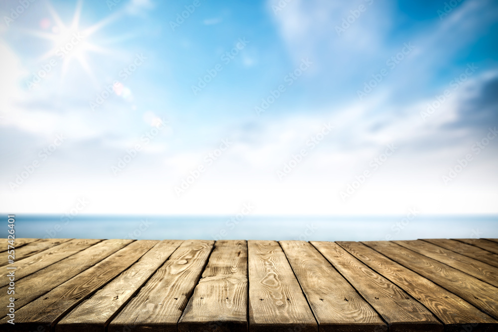 Desk of free space and summer sea landscape 