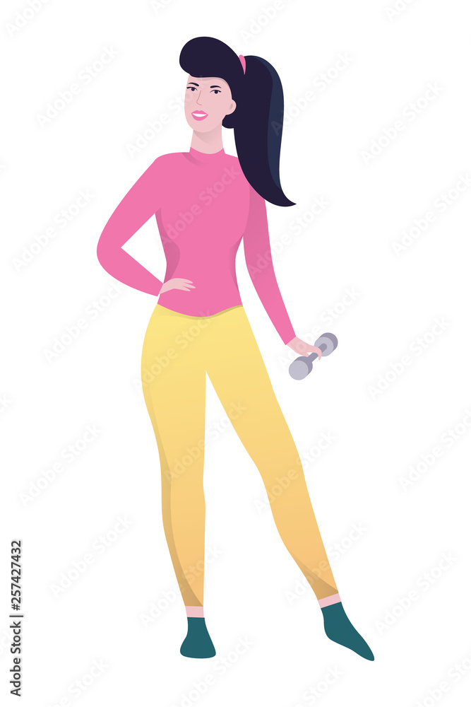 Beautiful fit woman standing and holding dumbbell Beautiful fit woman standing and holding dumbbell