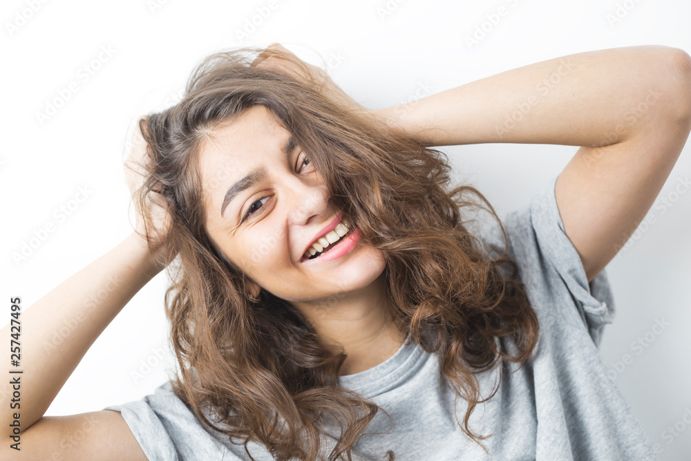 Cheerful and funny Indian girl on a white background. Positive cool happy  female. Emotional young woman. Stock Photo | Adobe Stock