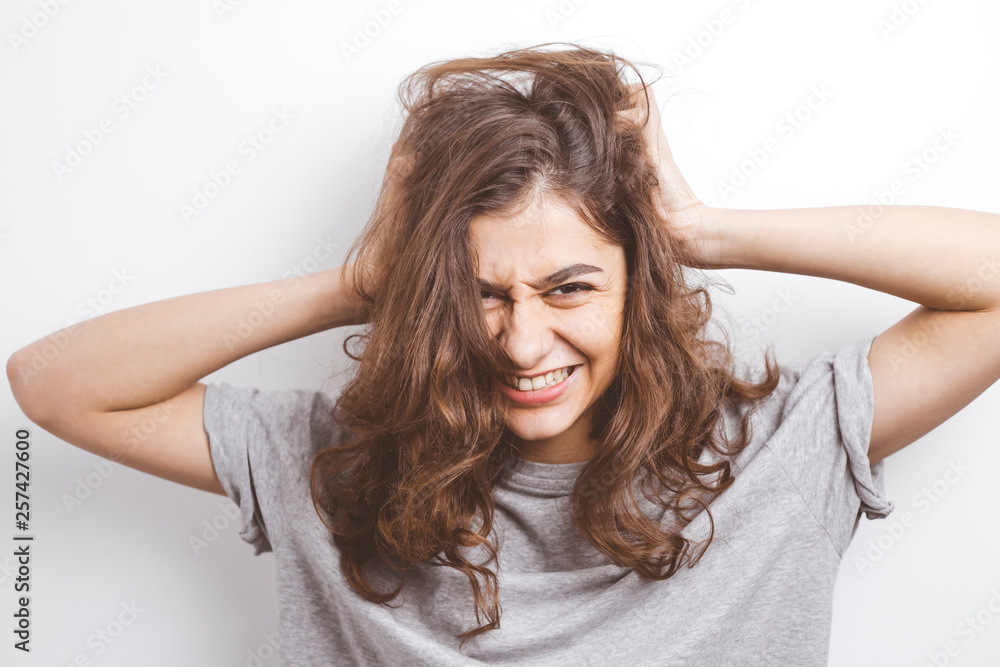 Angry and aggressive young woman. Emotion madness. Crazy girl. Angry and aggressive young woman. Emotion madness. Crazy girl.