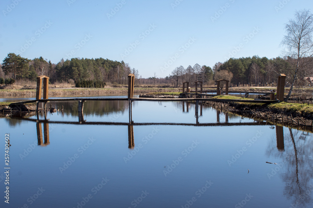 A beautiful place on the lake in a pine forest, a recreation center and slave fishing on the lake, a recreational place in Poland, Europe A beautiful place on the lake in a pine forest, a recreation center and slave fishing on the lake, a recreational place in Poland, Europe