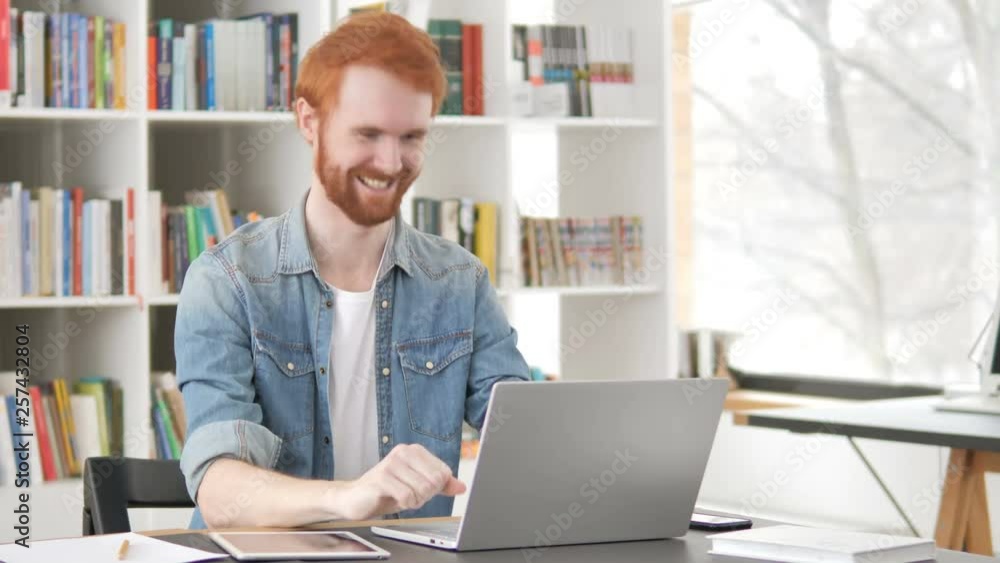Casual Redhead Man Celebrating Success of Project Casual Redhead Man Celebrating Success of Project