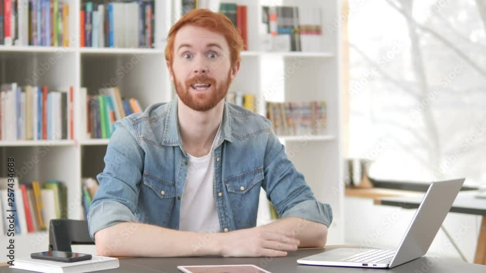 Talking Casual Redhead Man in Office Talking Casual Redhead Man in Office