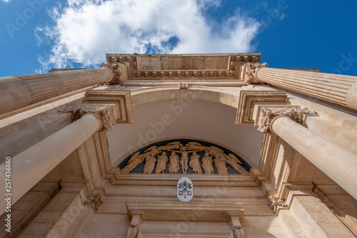 Facade of the cathedral Basilica of Saints Cosmas and Damian (Parrocchia Santuario Basilica S.S. Cosma E Damiano). Church in Alberobello, Puglia, Italy . Famous with trulli house. A region of Apulia photo