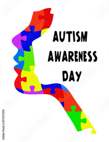 Autism awareness poster with a homan profile of multicolored puzzle pieces	