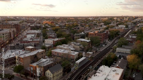 Subway Passing through Urban Neighborhood- 4k Aerial Cinematic