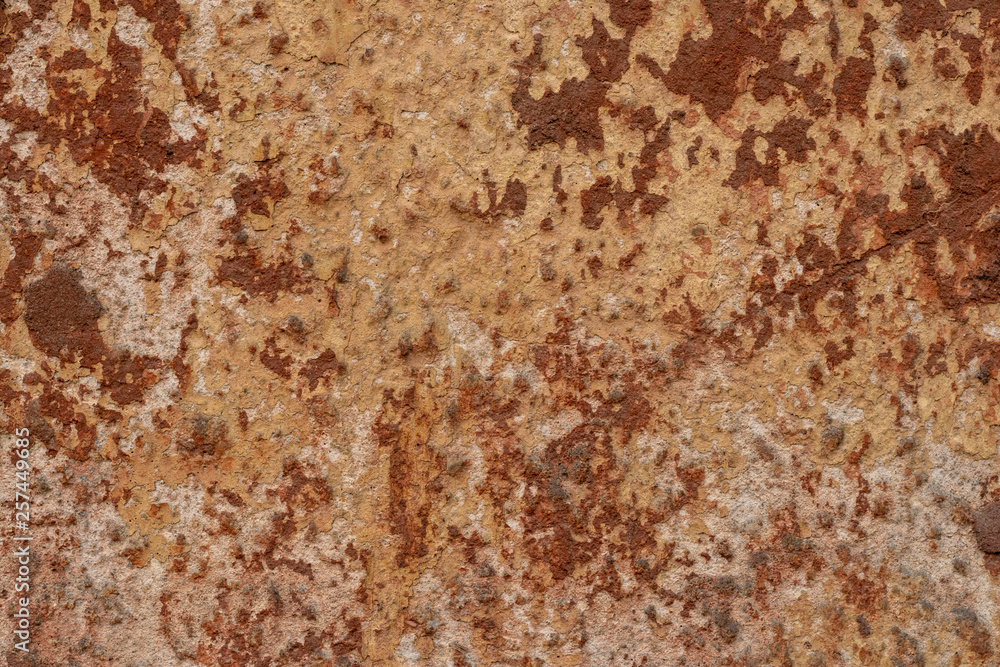 Texture of ferruginous brown wall. Retro rusty rough wall grunge stucco. Abstract grunge stucco wall background. Vintage abstract pattern with rusty wall. Grunge orange background texture. Texture of ferruginous brown wall. Retro rusty rough wall grunge stucco. Abstract grunge stucco wall background. Vintage abstract pattern with rusty wall. Grunge orange background texture.