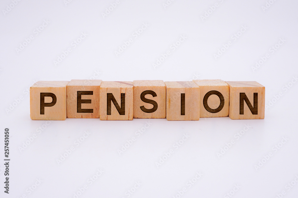 PENSION Word Written In Wooden Cube PENSION Word Written In Wooden Cube