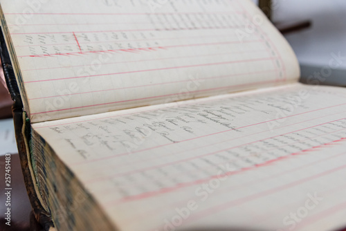 Antique handwritten accounting book of an old and inexistent business