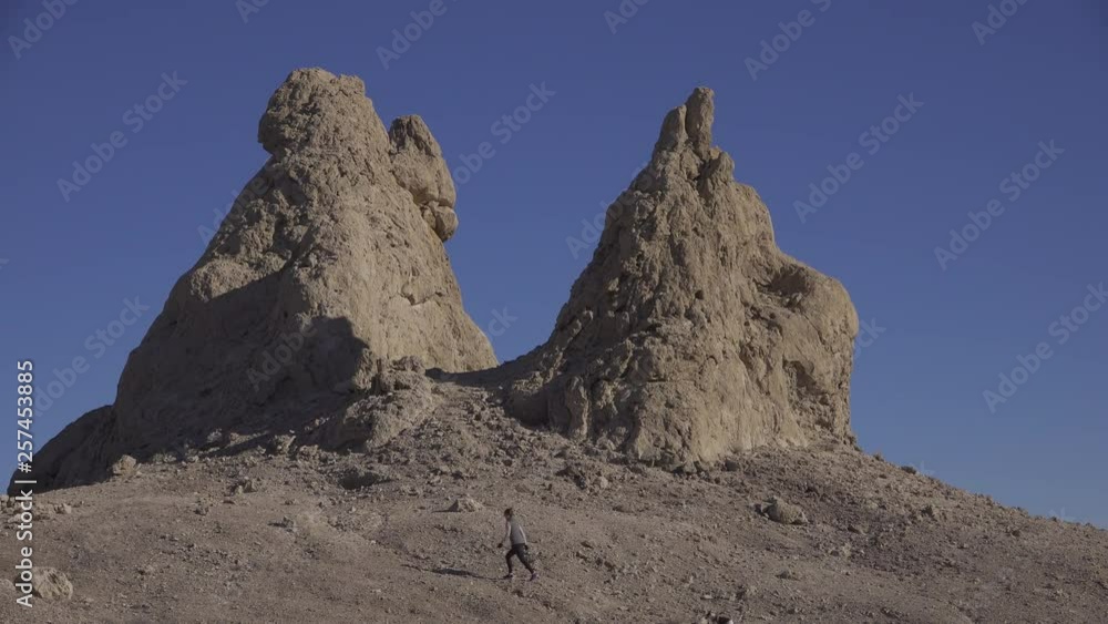 Woman Hiking By Pinnacles With Dogs Woman Hiking By Pinnacles With Dogs