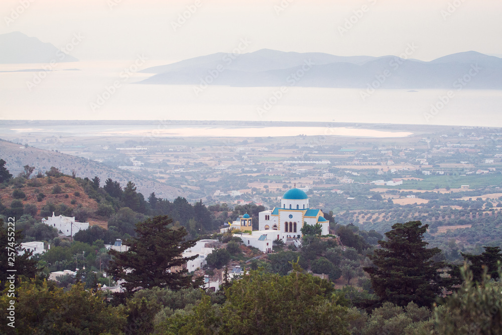 Landscape with an orthodox church and a mediterranean sea, Kos, Greece.