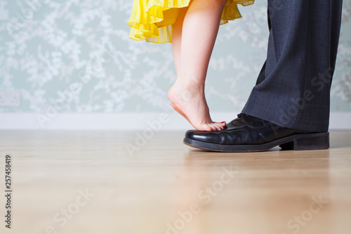 Young caucasian girl greeting her daddy from coming home from work