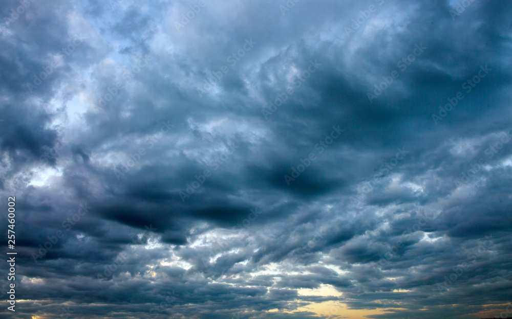 Dramatic sky with gray clouds. Abstract background.