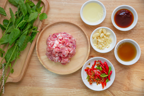 Raw minced pork with ingredients and seasoning for cooking thai food