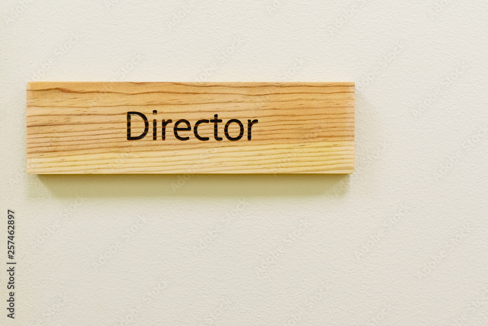 Wooden sign with the word Director