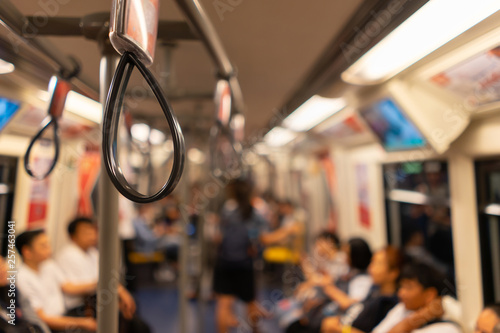 Photos BTS skytrain with office worker in rush hour at Bangkok, Thailand