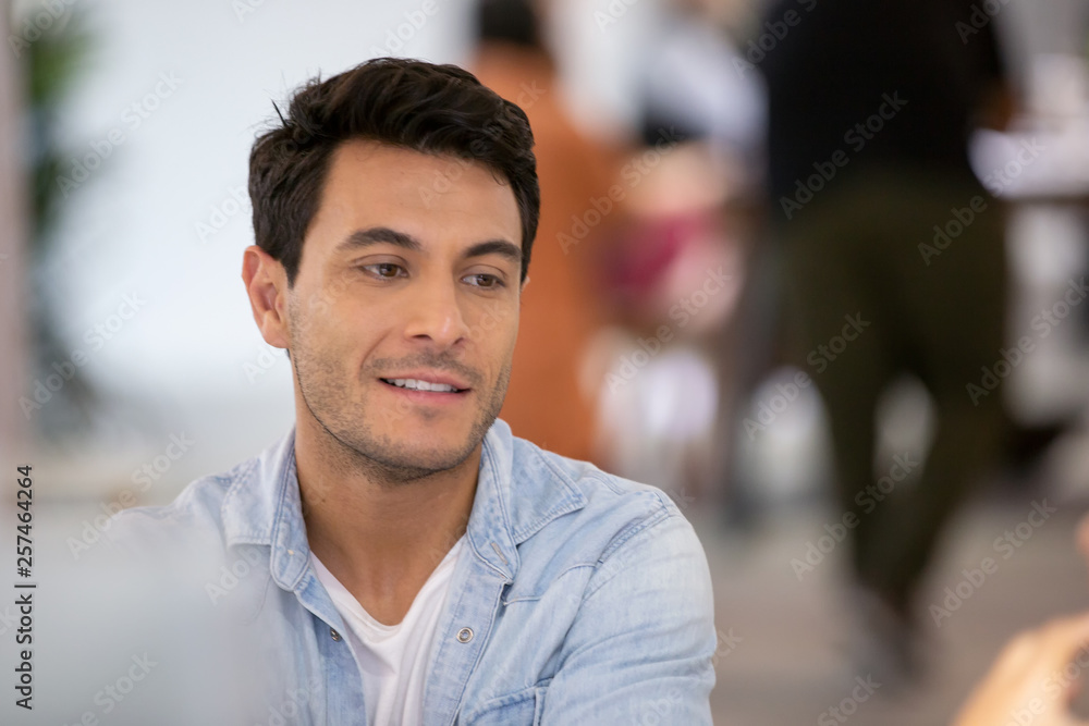Fototapeta premium portrait of a handsome young man in office