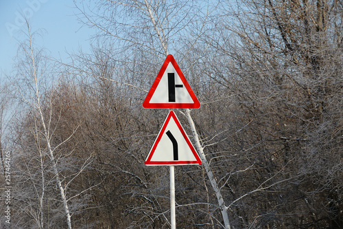 road signs in the winter forest