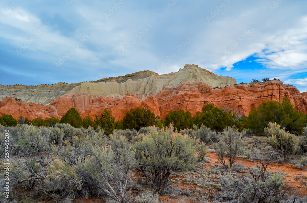 Kochorme State Park Utah with two toned rock mountain and dirt path