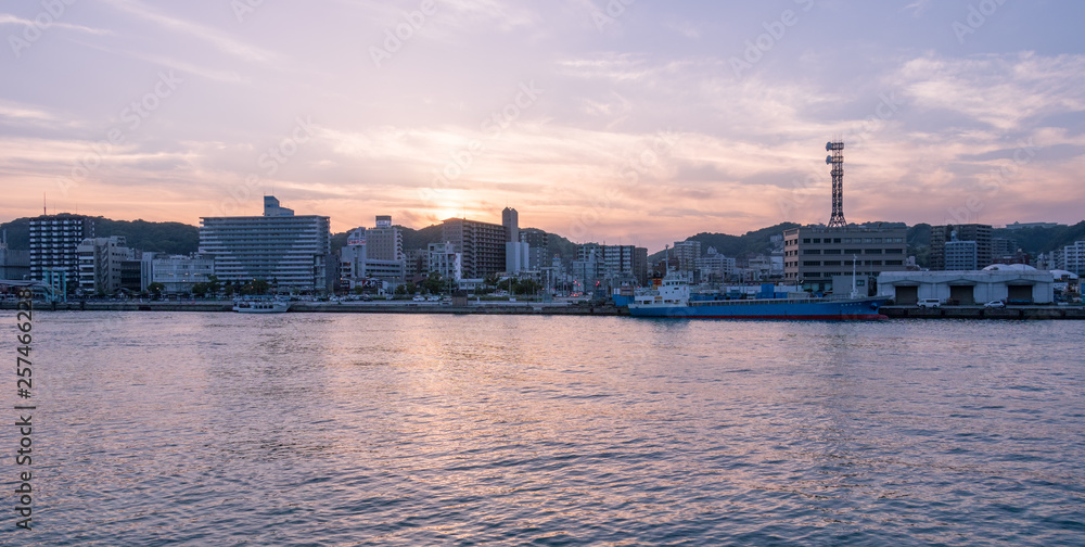 Panoramic view on Skyline of Kagoshima during sunset. Taken from the Harbour View Point. Located in Kagoshima, Kyushu, South of Japan.