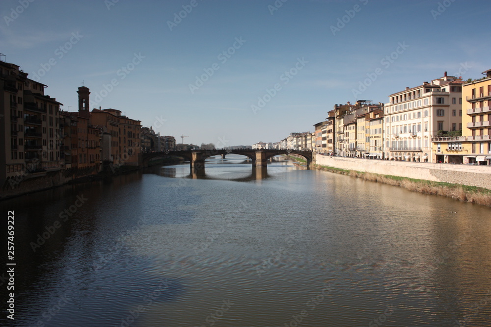 Tuscan middle bridge on the Florence canal on an Italian spring day