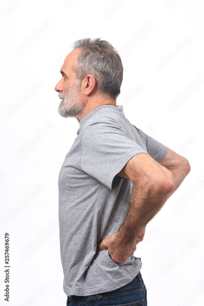 man with pain in the back on white background man with pain in the back on white background