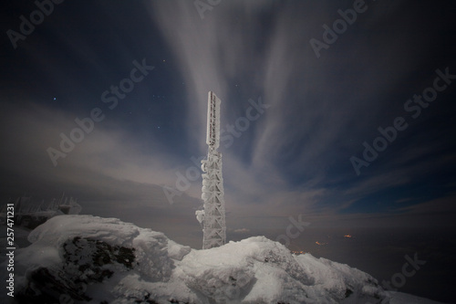 Mt. Washington communication equipment.  Signals from the mountain's antennas reach an area covering much of northern New England. They carry not just TV and radio programming but countless telephone signals-ordinary phone calls as well as FAA air traffic control data, plus police, fire and emergency services. Because these signals affect millions of peoples' lives and property 24 hours a day, the communications center simply cannot afford any downtime.    Until 1993, all of the center's communications traffic, along with the millions of dollars in electronic equipment that makes it possible, were extremely vulnerable to such natural phenomena as snow- and wind-induced static discharges.