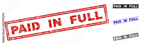 Grunge PAID IN FULL rectangle stamp seals isolated on a white background. Rectangular seals with grunge texture in red, blue, black and gray colors.
