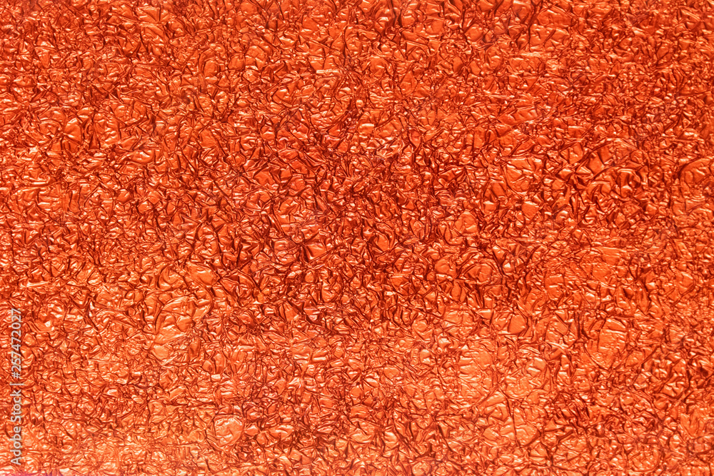 Fototapeta premium Abstract red crumpled paper background with place for text.