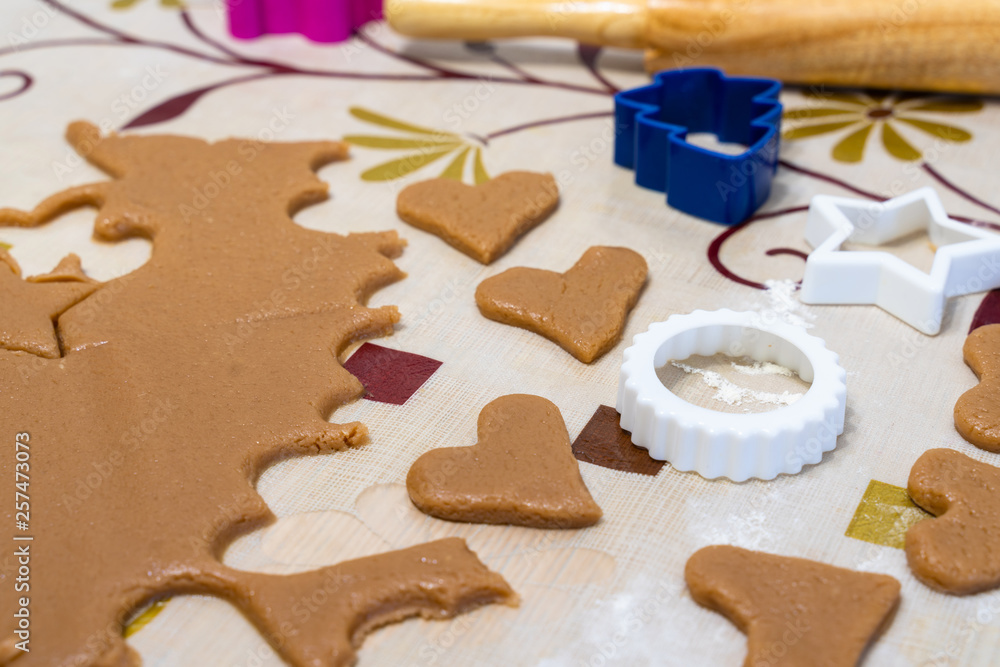 the process of cooking cookies at home. cut cookies from dough using shapes.