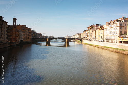 Tuscan middle bridge on the Florence canal on an Italian spring day © Alessia