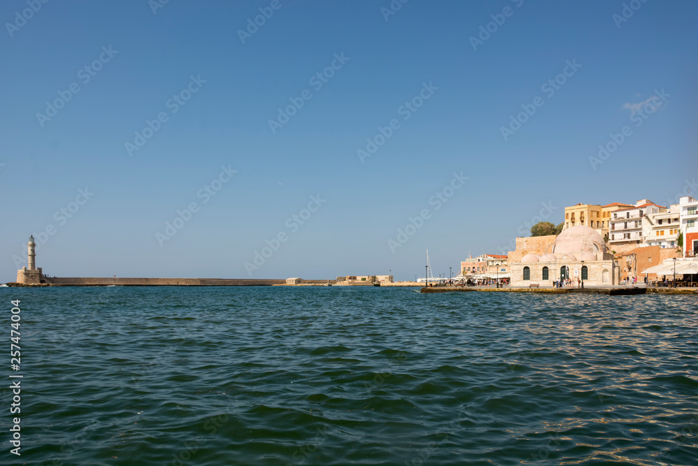 Chania Venetian Harbor and lighthouse. Romantic old town of Crete island of Greece