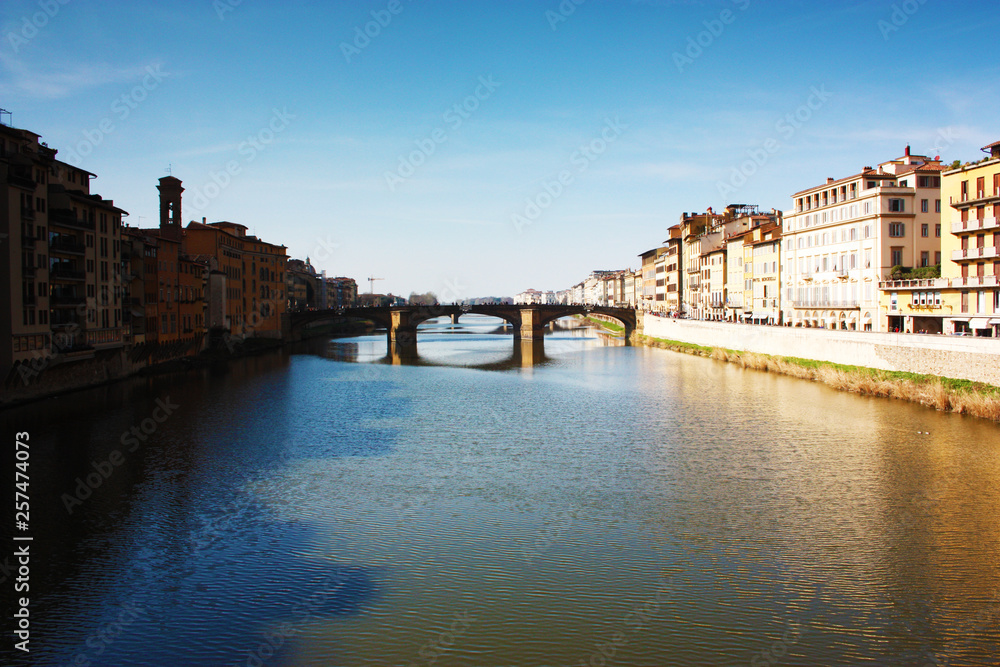 Tuscan middle bridge on the Florence canal on an Italian spring day
