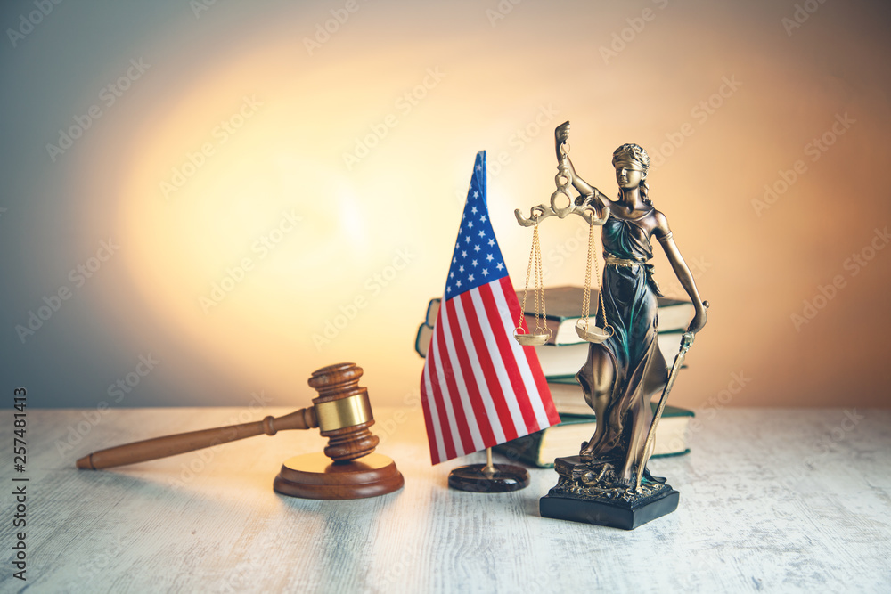 justice lady with judge and american flag on desk