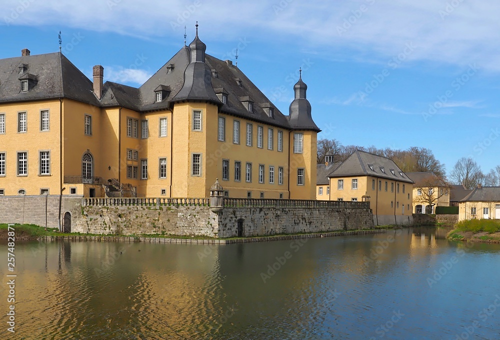 Yellow german castle Schloss Dyck in Juechen