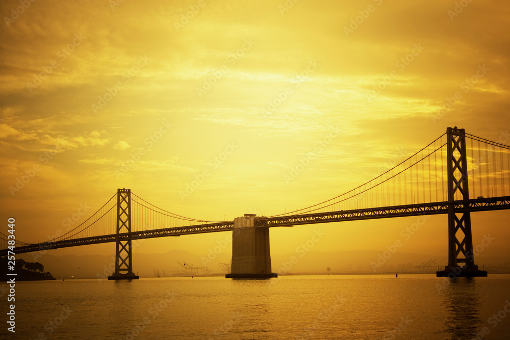 San Francisco Oakland Bay Bridge at dawn. San Francisco Oakland Bay Bridge at dawn.